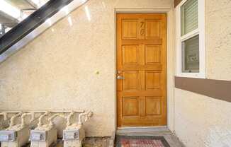 the front door of the house at Oak Terrace Senior Apts, Hemet, 92543