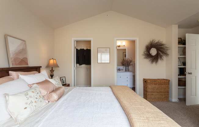 This is a photo of the primary bedroom in the 1016 square foot, 2 bedroom, 2 bath Nautica floor plan at Nantucket Apartments in Loveland, OH.