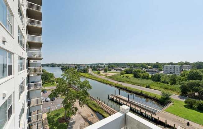 the view from the balcony of an apartment building overlooking a river at The Lafayette Apartments, Colonial Place, Norfolk