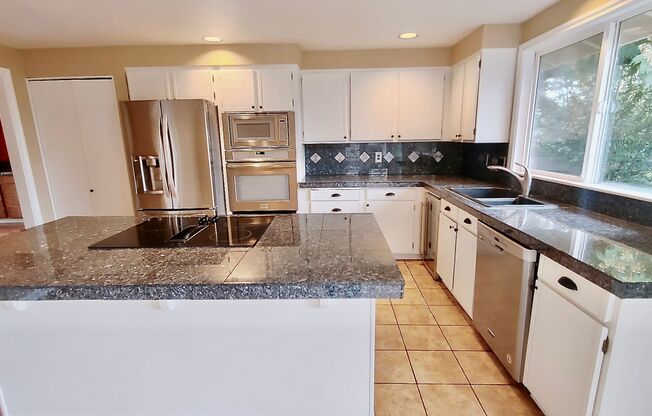 Welcome to this Gorgeous 4 Bedroom Home in the Desirable Westlake Neighborhood in Lake Oswego! Fresh Paint Throughout