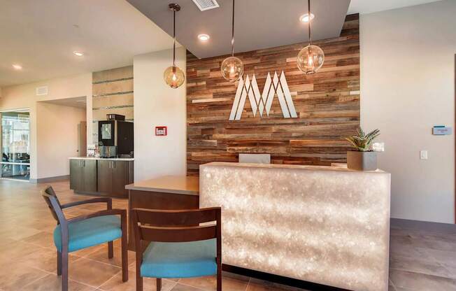 A reception area with a wooden wall and a white reception desk.