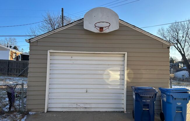 Charming Pet-Friendly Home with Fenced Yard and Detached Garage in East Sioux Falls