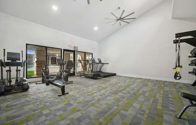 Community Fitness Center with Equipment at Villages at Metro Center Apartment located in Phoenix, AZ.