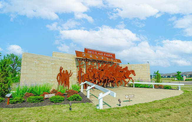 a mural of cattle on the side of a building