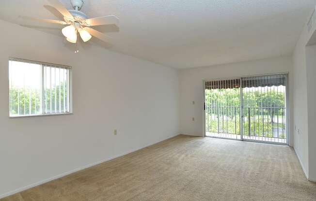 Living Room With Expansive Window at St. Andrews Palm Beach Apartments, West Palm Beach , 33411
