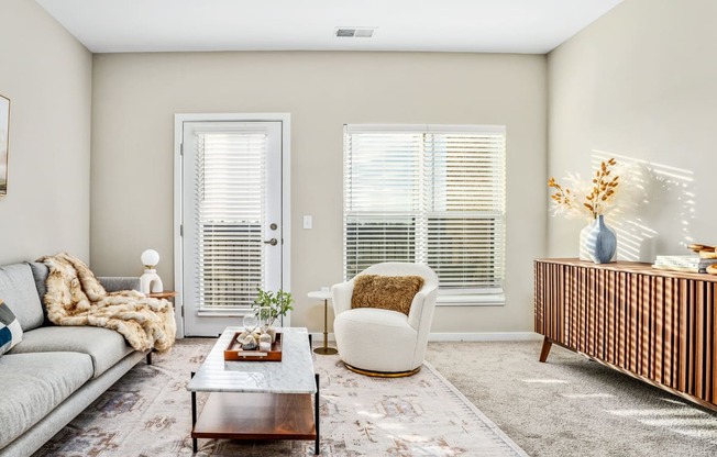 a living room with a couch and a coffee table