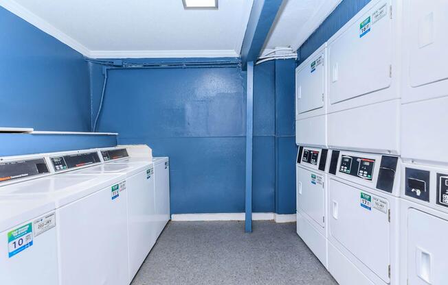 a kitchen with a blue background