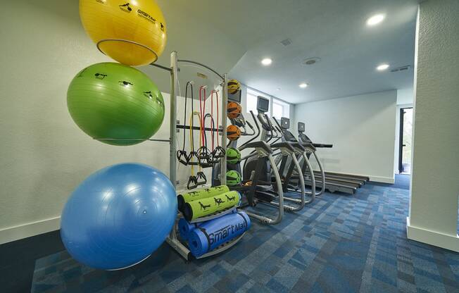 modern interior of apartment building with workout equipment