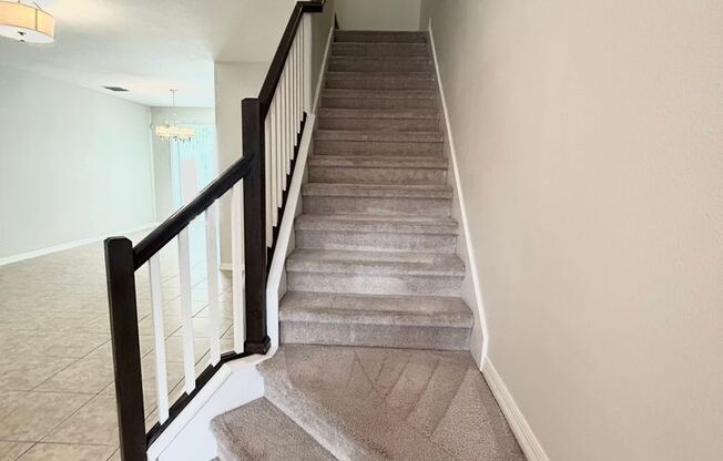 Stylish 3/2.5 Townhome with Open Floor Plan, Garage & Patio in Gated Community
