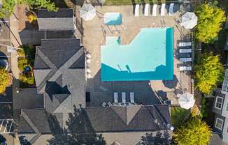 arial view of a house with a swimming pool on the roof