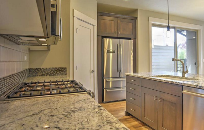 2 bed, 2.5 bath Exquisite Harris Ranch Mill District Square Townhome!