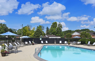 Experience relaxation at its finest with our pristine outdoor pool area.