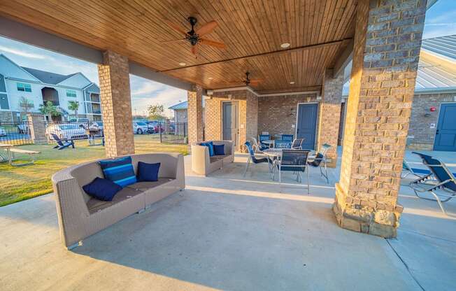 Shaded Outdoor Area by Pool at Parkside Grand Apartments in Pensacola, FL