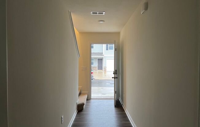 Beautiful New Construction 3 bedroom 2.5 Condo   with garage- Water, trash & sewer incuded!