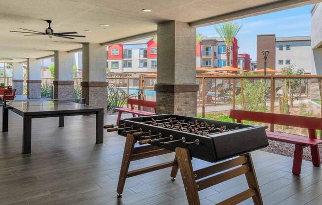 a foosball table in the lobby of a building at Weylyn Luxury Apartments, Arizona