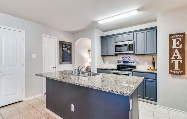 This beautiful 4 bedroom, 2 bath home is located within walking distance to pool, parks & playgrounds