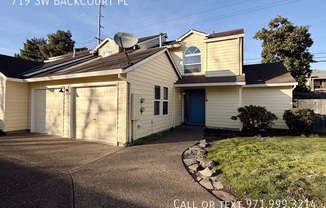 719 SW BACKCOURT PL