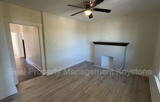 122 E 16 AVE