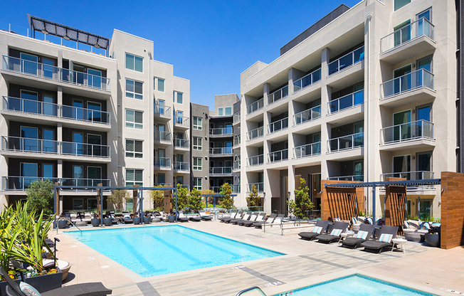 Stunning Pool and hot tub with cabana seating