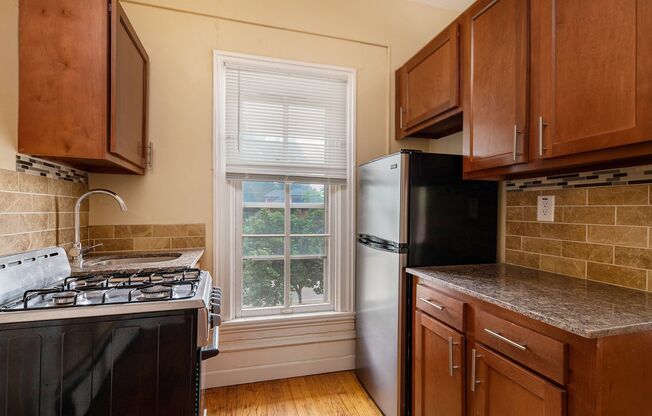 Attractive Remodeled Efficiency 2nd floor Studio, turn of the century building NO UTILITIES! - Ask about our no security deposit option!