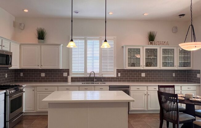 Live in Comfort and Style in the Prestigious Ocotillo Community!