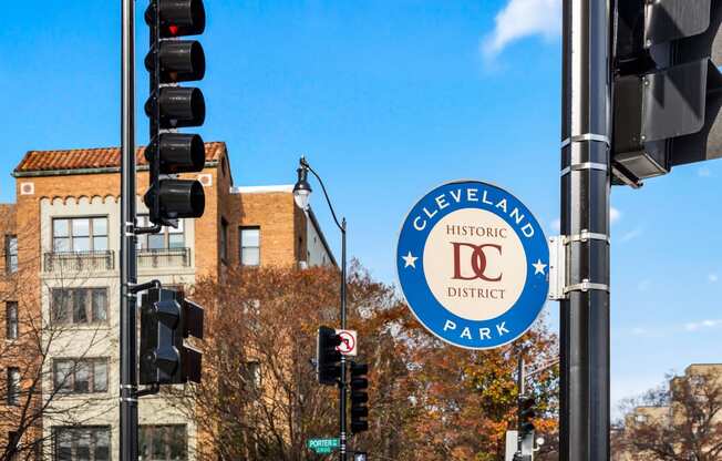 a city street with a sign for georgetown historic district park