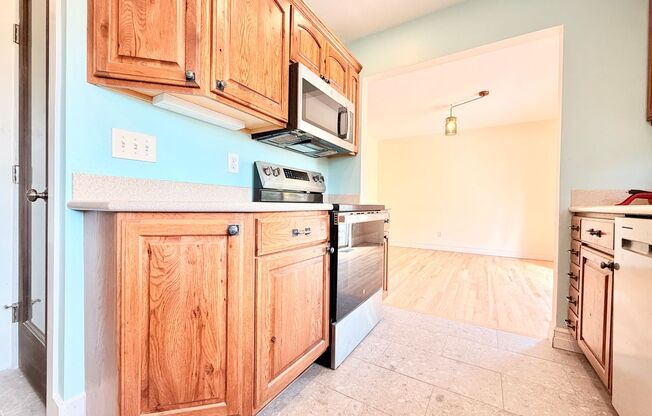 Charming Updated 1950s Home with Refinished Hardwoods & Large Fenced Yard – Landscaping Included!