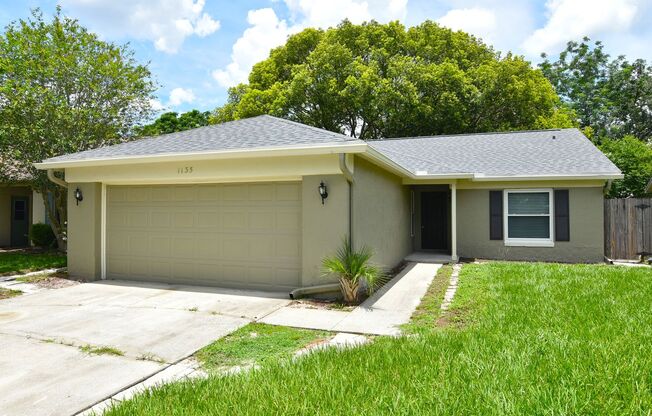 Water view 3/2 in Alafaya Woods. UPDATED kitchen and windows/doors..