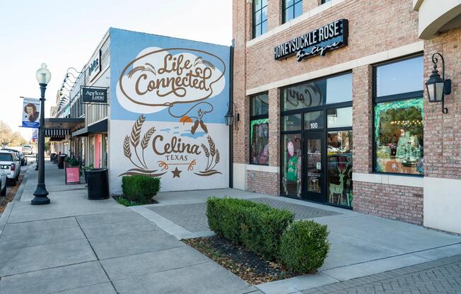 A Downtown Celina streetscape featuring local boutiques and a signature mural, reflecting the area’s character and strong sense of community.