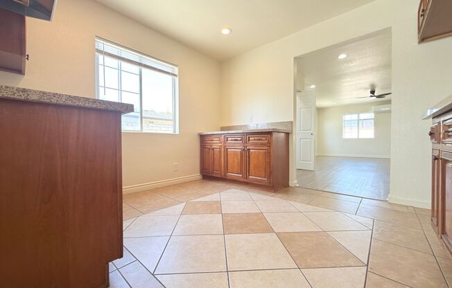 Spacious 4-Bedroom, 2-Bath Gated Home with Garage & Private Backyard