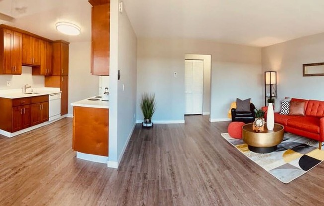 a living room with a couch and a kitchen at Element LLC, Sunnyvale, CA, 94086