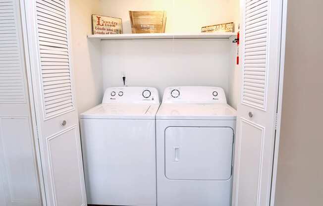 Washer and dryer full size in closet