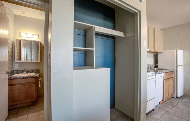 Studio Bathroom Vanity and Closet at University Manor Apartments in Tucson Arizona