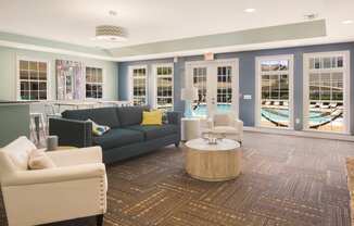 Stylish and spacious clubhouse interior with comfortable seating at Angel Landing apartments in Pensacola, FL