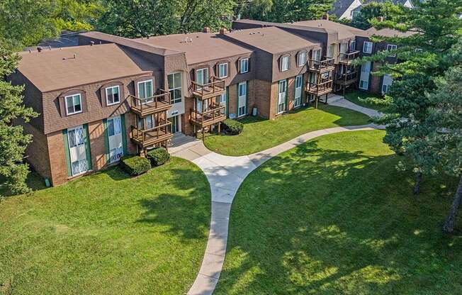 an aerial view of an apartment complex with walkways and balconies
