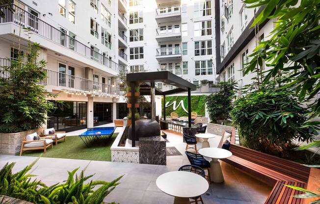 You'll enjoy lush green space, plentiful seating, an outdoor kitchen and more in the verdant courtyards at Modera San Diego