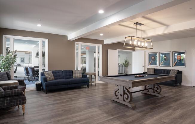 a room filled with furniture and a wood floor