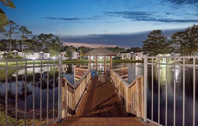 Community Lake with Deck at Vue at Baymeadows Apartments located in Jacksonville, FL.