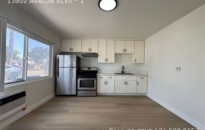 13802 AVALON BLVD