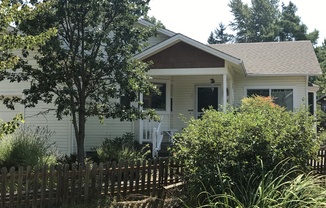 Bright and charming Ashland home next to seasonal creek