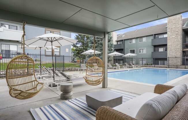 The Community Pool and Lounge Area at Hilltop View Apartments