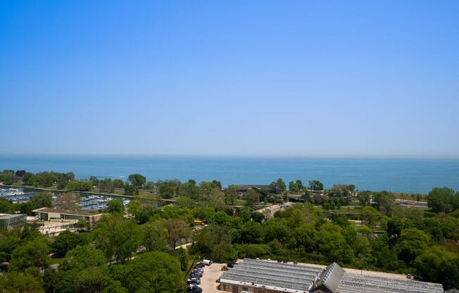 the view of the water from the top of a building  at The Belden Stratford, Chicago