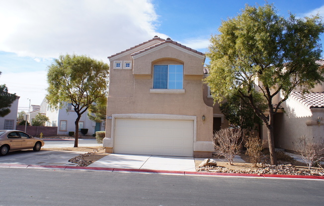 THIS IS A CHARMING TWO-STORY NORTH LAS VEGAS HOME WITH 2 BEDROOMS, 2.5 BATHS AND A TWO-CAR ATTACHED GARAGE. FEATURING TILE AND CARPET FLOORING, NEUTRAL PAINT, AND BLINDS THROUGHOUT, THE MAIN LEVEL OFFERS AN OPEN LIVING AND DINING AREA THAT FLOWS INTO A KI