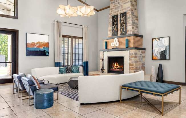 a living room filled with furniture and a fireplace