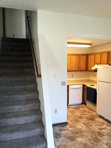 Kitchen And Stairs at Wellington Townhomes, Grand Forks, ND, 58201