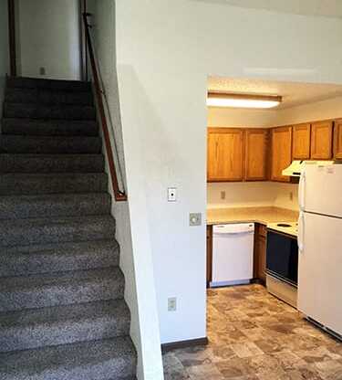 Kitchen And Stairs at Wellington Townhomes, Grand Forks, ND, 58201