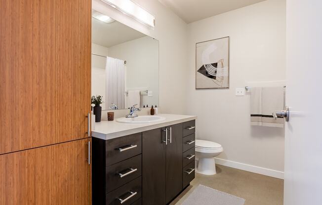 bathroom features washer and dryer in unit