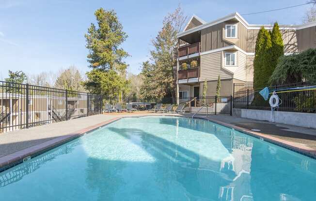 the swimming pool at the falls at rolland park apartments