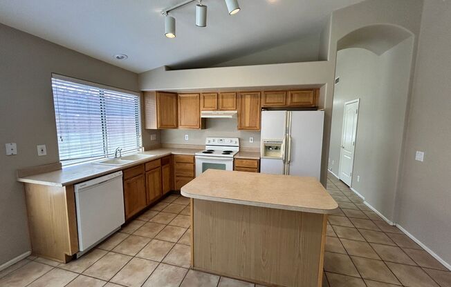 Warm, Inviting 3 Bed / 2bath Home in Canyon Trails with new Paint and Flooring!!!