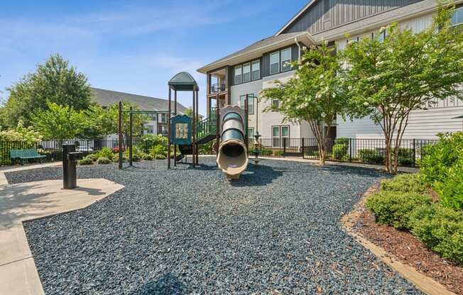 the preserve at ballantyne commons playground with slides and trees